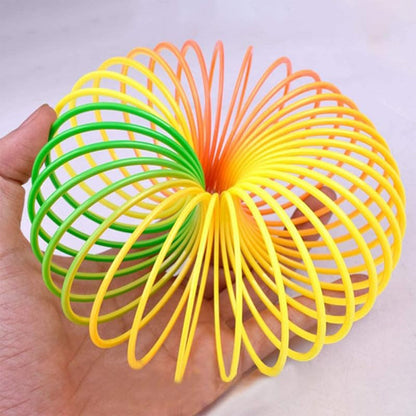 Rainbow Slinky Spring Toy – Compact, Portable Fun Toy for Kids & Adults, Great for Birthdays (1 Pc)